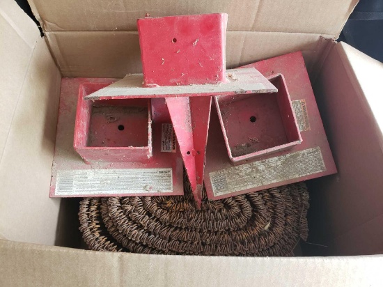 Box of 3 ground post holders and wire roll