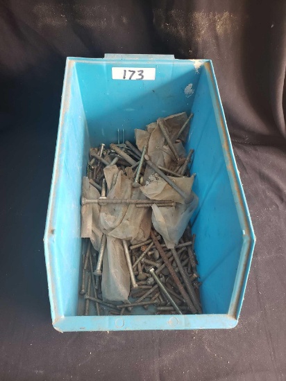 Blue organizing bin with bolts