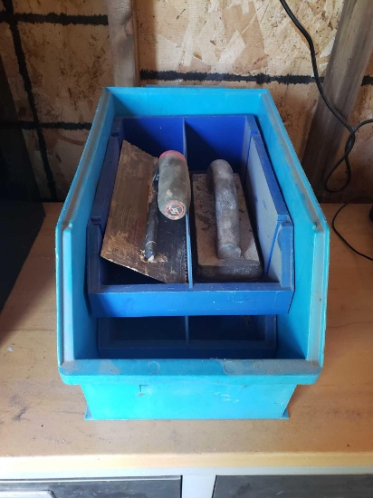 Large plastic organizer and medium containers and drywall trowels