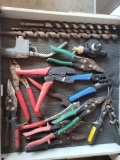 Drawer of metal snips and drill bits