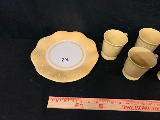 Yellow serving platter and coffee cups (8)