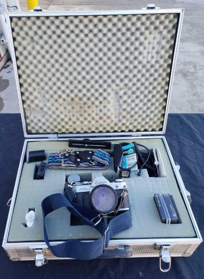 CANNON camera and traveling case