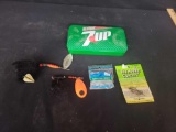 Fishing tackle in 7up metal tin
