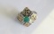 Platinum and 18k Yellow Gold Emerald and Diamond Ring