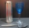 Assorted lot, silver cheese slicer with carved handle, plastic blue wine glass, metal tin