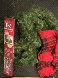 4 pine wreaths, bow maker in box and red plaid table cloth