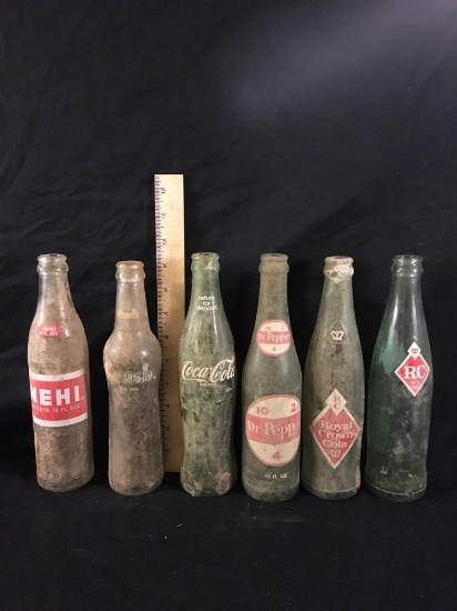 Six Vintage Soda Bottles