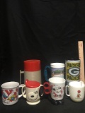 Various Vintage Thermos Cups And Mugs