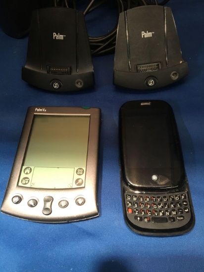 2 Palm Devices With Charging Stations