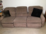 Tan Sofa With Reclining Seats On Both Ends