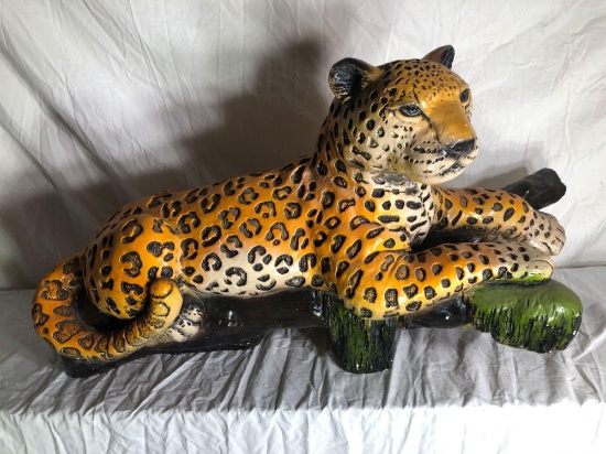 Large Leopard Lounging On A Log