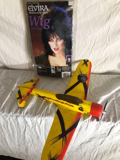 Elvira Wig And Toy Airplane