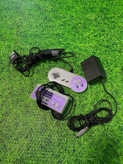 Super Nintendo controllers and power cord