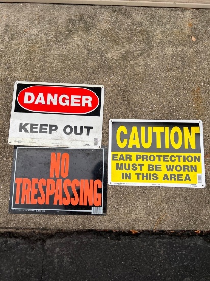 3 Thing metal caution, danger, and no trespassing signs