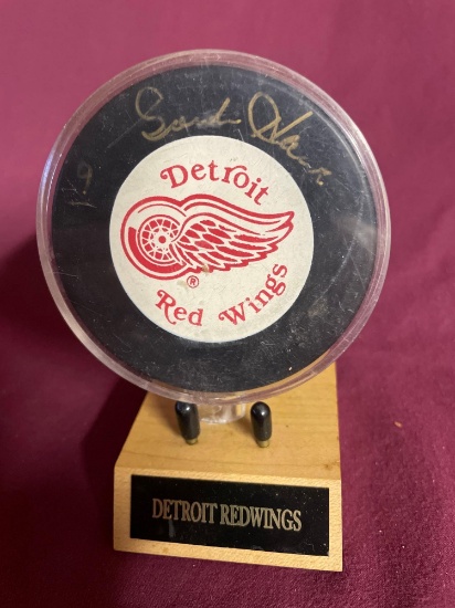 Signed Red Wings Hockey Puck