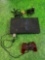 playstation 2 with wires and controller