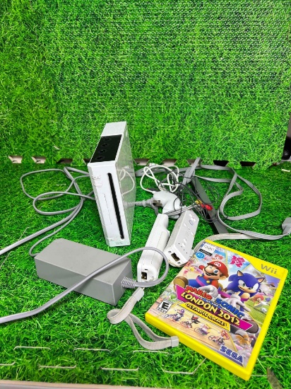 nintendo wii system with remotes and mario game