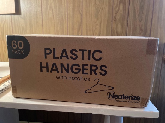 Box of New Plastic Hangers