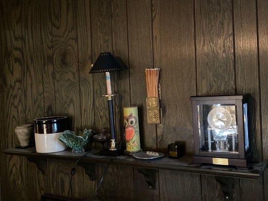 Assorted Collectibles On Mantle