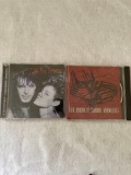 Signed Ted Nugent and Def Leppard CDs