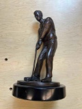 brass golf statue