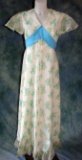 Vintage Ladies 1960s Maxi Dress With A Flocked Floral Pattern
