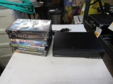 Assorted DVDs and Sanyo Player