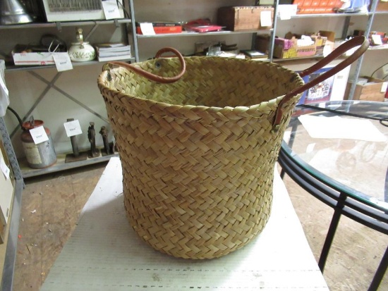 Vintage basket with leather handles.