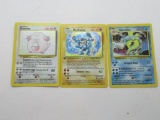 3 Holographic Pokemon Cards - Chansey 3/102, Machamp 8/102, Gyarados 6/102