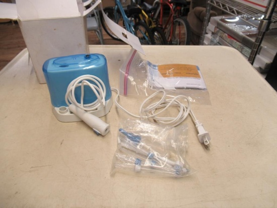 New Waterpik Water Flosser