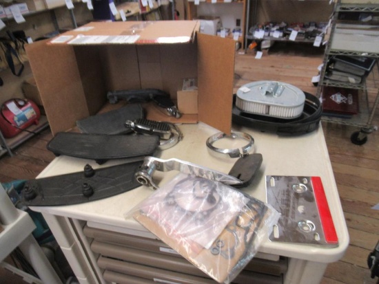 Assorted Harley Davidson parts.