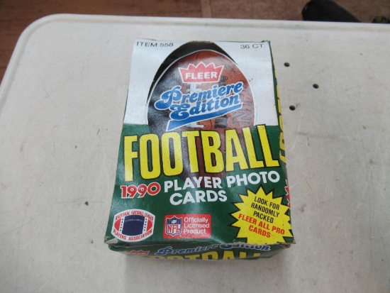 Box of unopened fleer football cards