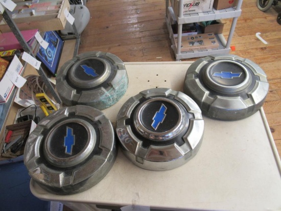 4 Vintage Chevy Hubcaps