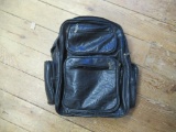 Leather motorcycle touring bag. 8 pocket with straps.