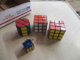 4 vintage Rubix cubes.