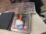 2 binders of sports cards.