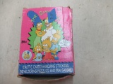 Box of unopened packs of tops Simpson cards