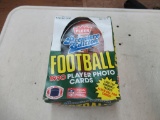 Box of unopened fleer football cards