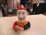 Cast iron joker piggy bank