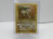 VINTAGE 1999 Fossil HITMONLEE Holo 7/62 Pokemon Card
