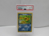 PSA Graded Pokemon FOSSIL 1st Edition NM-MT 8 - PSYDUCK #53