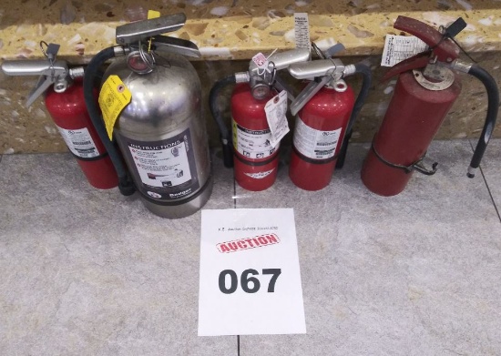 Lot of five fire extinguishers.