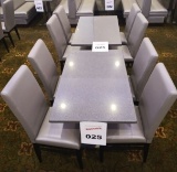 Two tables and 8 chairs.