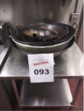 7 different size Wok pans and stainless steel table, some very large
