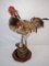 Barnyard rooster on vintage barn pulley