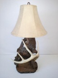 Driftwood lamp with large deer antler