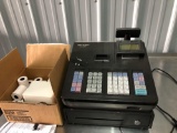 Sharp cash register w/box of paper