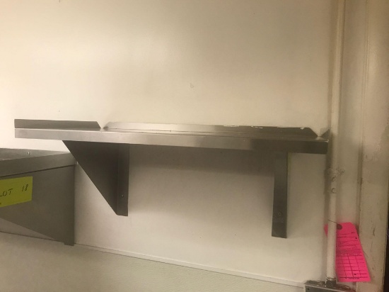 Wall mounted stainless steel shelf. 24 inches wide, 12 inches deep