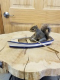 Squirrel in a boat