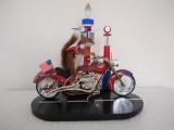 Red squirrel on motorcycle